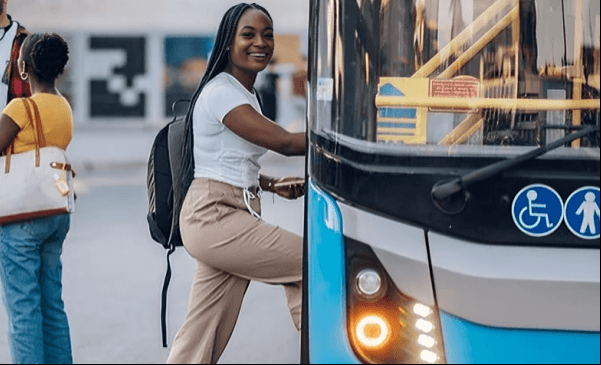 Girl boarding a bus
